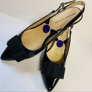 A Vittadini Black patent leather slingbacks 8.5